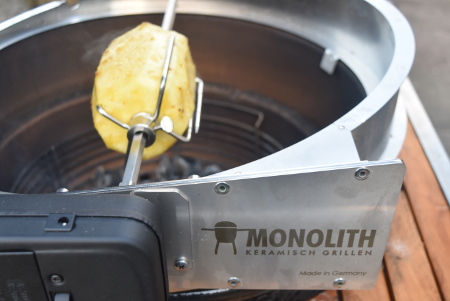 The Monolith's rotisserie attachment is perfect for cooking this boozy pineapple