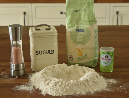 Getting the ingredients for the pesto pizza dough together