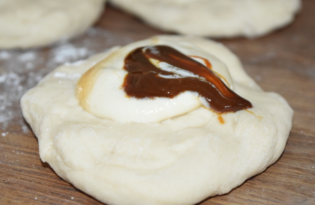 The little dough ovals topped with cheesy sauce and Marmite
